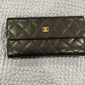 Authentic Chanel flap wallet. Comes with card, duster, and the box.